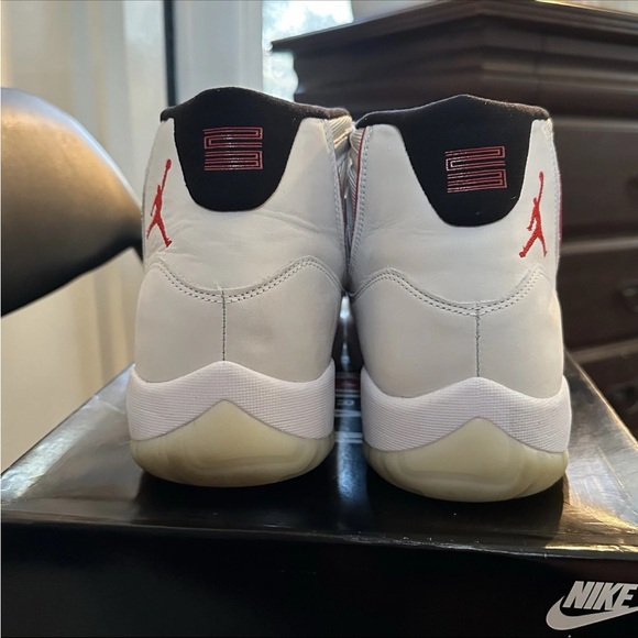 Nike Air Jordan 11 Retro “Platinum Tint/University Red” sneakers